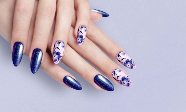 hand-girl-blue-manicure-long-colored-acrylic-nails-female-manicure-floral-patterns_com